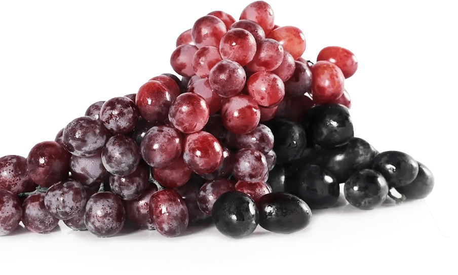 A pile of grapes sitting on top of each other.